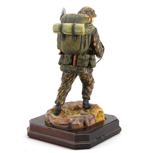 422 - Ashmore for Worcester porcelain commemorative military figure raised on a wooden plinth base, Soldie... 