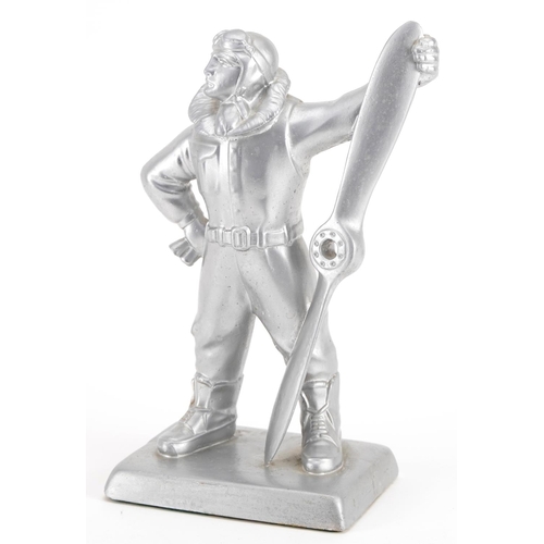 1383 - Military interest silvered figure of an RAF pilot, 27cm high