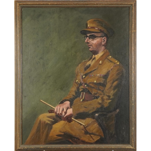 346 - Three quarter length portrait of a seated gentleman wearing military uniform, oil on board, framed, ... 