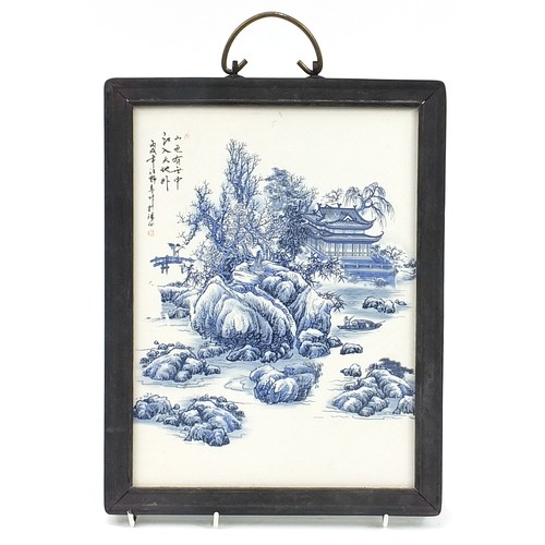 621 - Chinese blue and white porcelain panel with hardwood frame hand painted with a winter landscape, ove... 