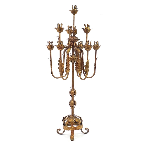 255 - Ornate gilt metal ten branch candelabrum, 97cm high