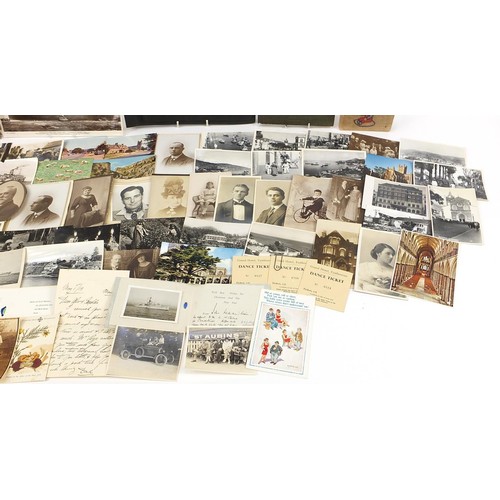 551 - Collection of 19th century and later postcards and photographs, some arranged in albums, including m... 