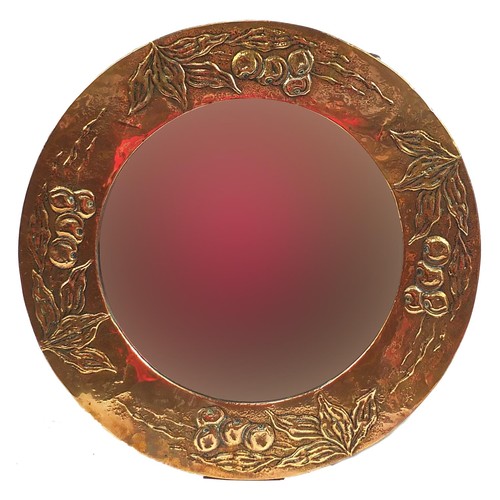 156 - Manner of Liberty & Co, Arts & Crafts circular copper wall mirror with bevelled plate embossed with ... 