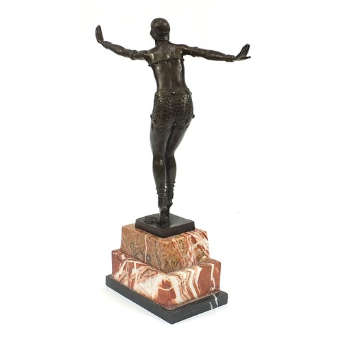 234 - Large patinated bronze figurine of an Art Deco style dancer raised on a stepped marble base, 49cm hi... 