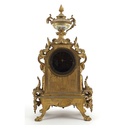20 - French gilt metal mantle clock with enamelled dial and Sevres style panel hand painted with a courti... 