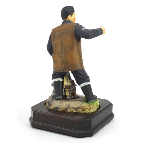 432 - Ashmore for Worcester porcelain commemorative military figure raised on a wooden plinth base, A Memb... 