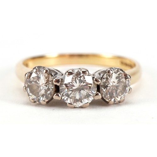 1401 - 18ct gold diamond three stone ring, total diamond weight approximately 1.6 carat, the central diamon... 