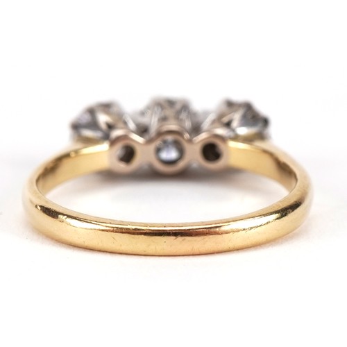 1401 - 18ct gold diamond three stone ring, total diamond weight approximately 1.6 carat, the central diamon... 