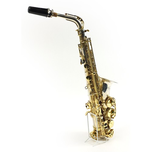 398 - Liberty by Selmer chrome plated and brass alto saxophone with protective carry case and stand, numbe... 