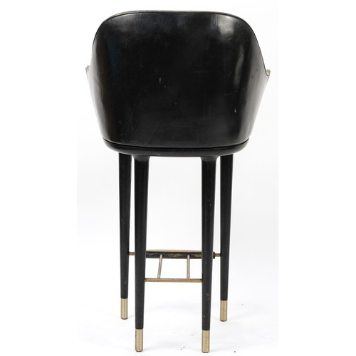 784 - Style Matters black leather and ebonised bar stool with footrest, 106cm high