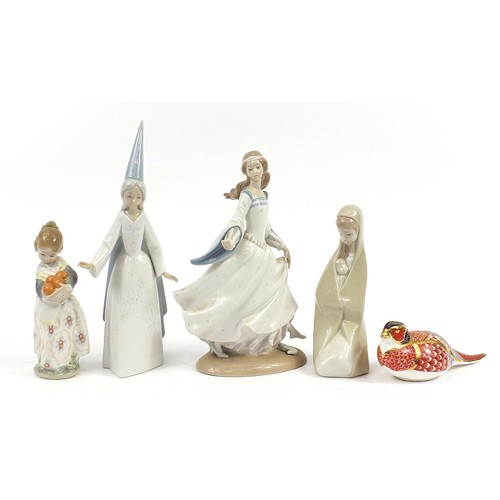 449 - Four Lladro porcelain figurines and a Royal Crown Derby Imari porcelain bird paperweight, the larges... 