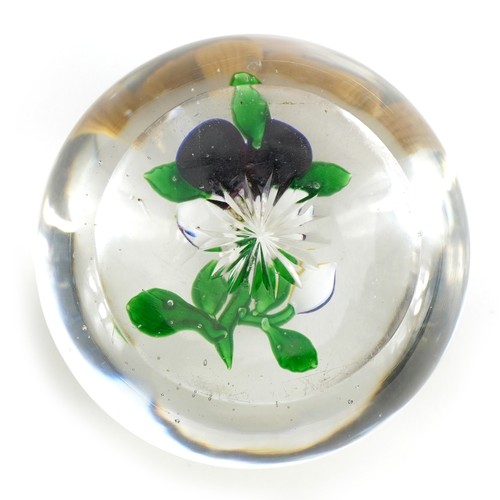 40 - 19th century Baccarat floral glass paperweight with paper label inscribed 199 to the base, approxima... 