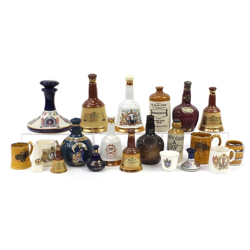 1185 - Collection of empty Wade advertising decanters and coronation mugs including Chivas Brothers and The... 