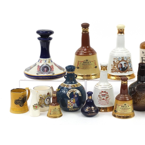 1185 - Collection of empty Wade advertising decanters and coronation mugs including Chivas Brothers and The... 