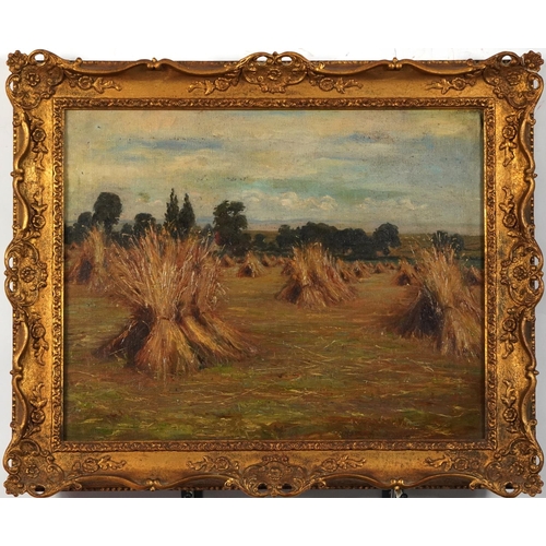 295 - Manner of Henry H Parker - Rural landscape with hayricks, label verso, English school oil on canvas,... 