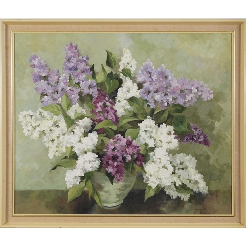 386 - Joan Hadfield - Still life flowers in a vase, oil on canvas, Winsor & Newton stamp verso, mounted an... 