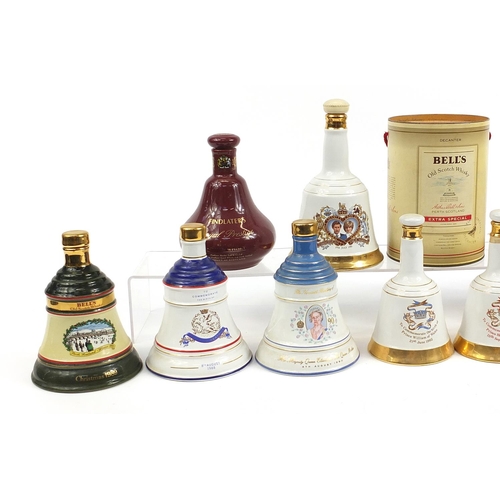 1178 - Twelve empty Bells whisky commemorative Wade  decanters