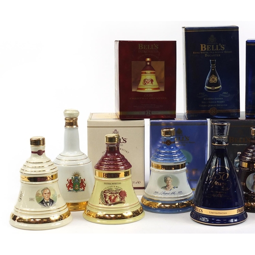 962 - Eight Bells 8 Year whisky commemorative sealed decanters with contents, seven with boxes, including ... 