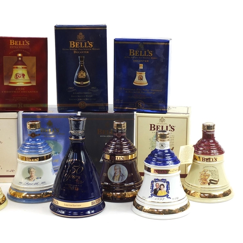 962 - Eight Bells 8 Year whisky commemorative sealed decanters with contents, seven with boxes, including ... 