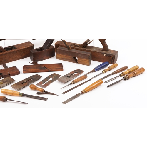 687 - Collection of vintage woodworking planes and chisels, the largest 42cm in length