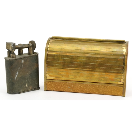 1014 - Large Dunhill style silver plated table lighter and a brass roll top cigarette dispenser, the larges... 