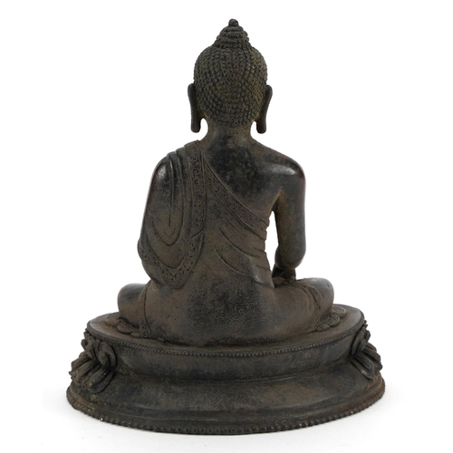 461 - Chino Tibetan patinated bronze figure of Buddha, 21cm high