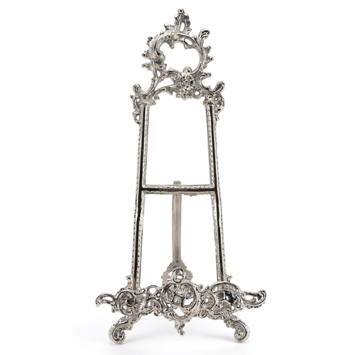 838 - Rococo style silvered metal easel stand, 41cm high