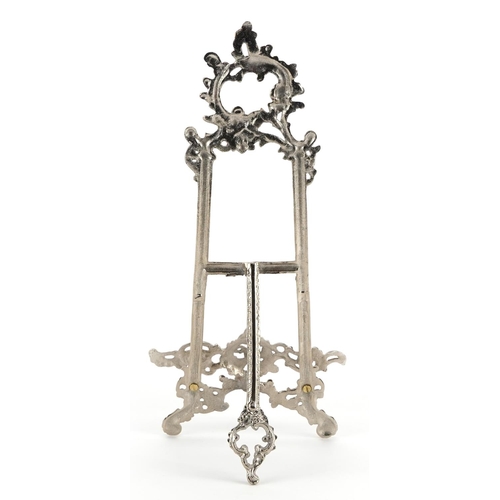 838 - Rococo style silvered metal easel stand, 41cm high