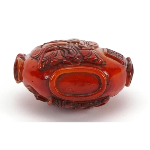 1013 - Chinese amber coloured snuff bottle with character marks and stopper, 7cm high