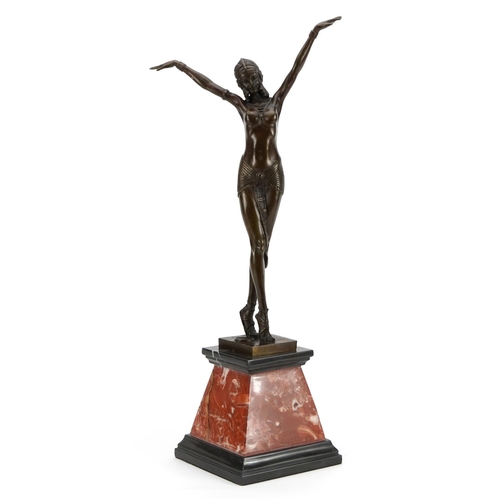 1007 - Large patinated bronze figurine of an Art Deco female raised on a tapered marble and black slate bas... 