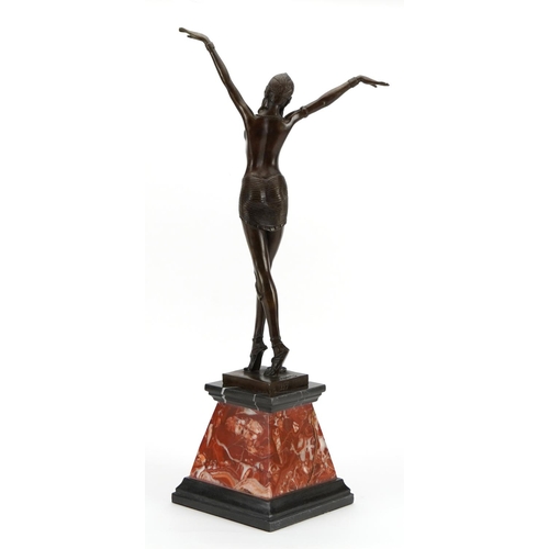 1007 - Large patinated bronze figurine of an Art Deco female raised on a tapered marble and black slate bas... 