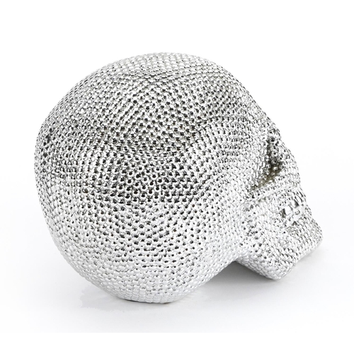 802 - Silvered model of a human skull, 19.5cm high