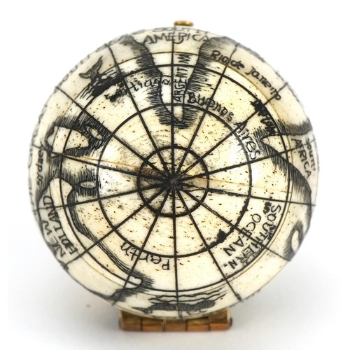 840 - Sailor's style carved bone pocket globe compass, 4cm in diameter