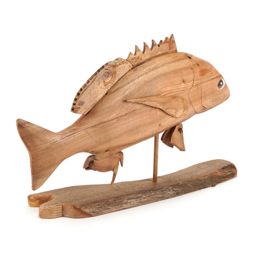 289 - Clive Fredriksson, wooden carving of a piranha fish, 35cm high