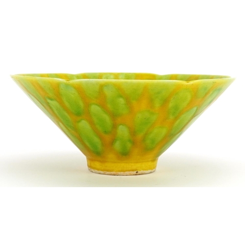 620 - Chinese porcelain bowl having a green and yellow spotted glaze, character marks to the base, 16cm in... 