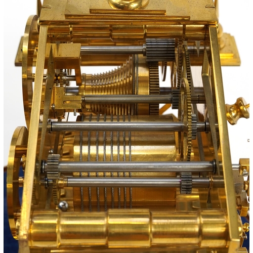 41 - Gilt brass Congreve rolling ball clock with fusee movement and three chapter rings housed under a gl... 