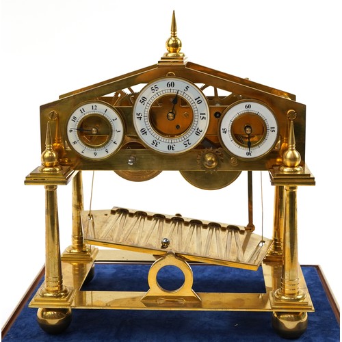 41 - Gilt brass Congreve rolling ball clock with fusee movement and three chapter rings housed under a gl... 
