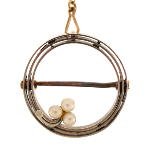 2088 - 15ct gold seed pearl brooch with safety chain, 1.9cm in diameter, 3.1g