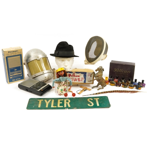 1180 - Sundry items including a vintage Tyler St metal sign, two fencing helmets, Pelham puppet with box an... 