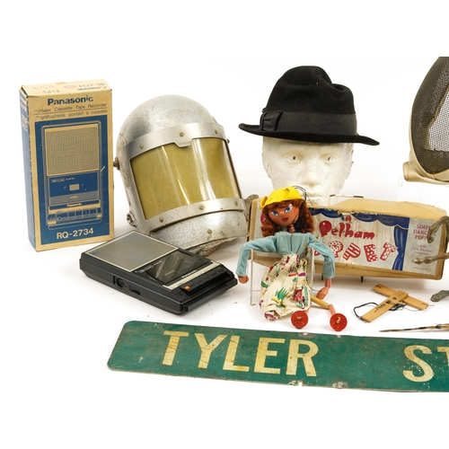 1180 - Sundry items including a vintage Tyler St metal sign, two fencing helmets, Pelham puppet with box an... 