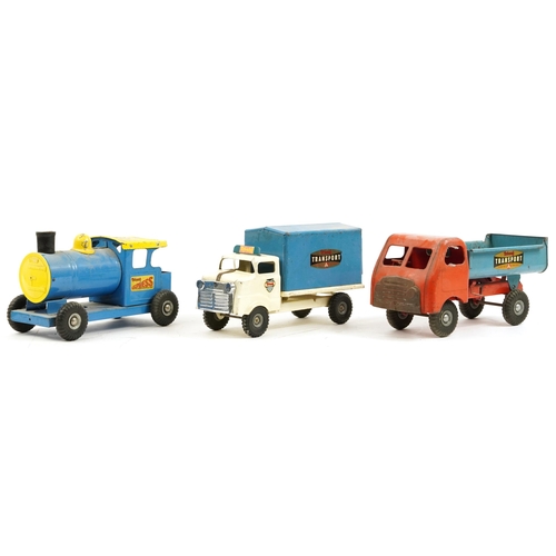 1573 - Two vintage Tri-ang tinplate trucks and an Express locomotive, the largest 34cm in length