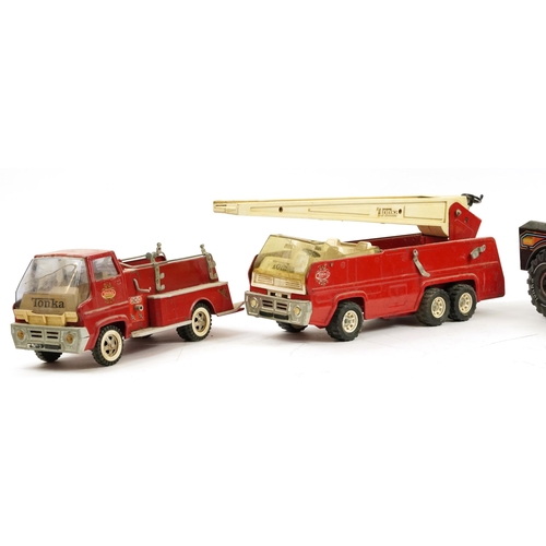 1578A - Four vintage Tonka vehicles including two fire engines, the largest 59cm in length