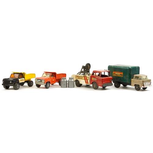 1569A - Four vintage tinplate Marx and Tri-ang vehicles including break down service truck and express deliv... 