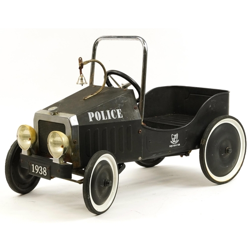 1584 - Retro child's pedal car in the form of a police car, 79cm in length