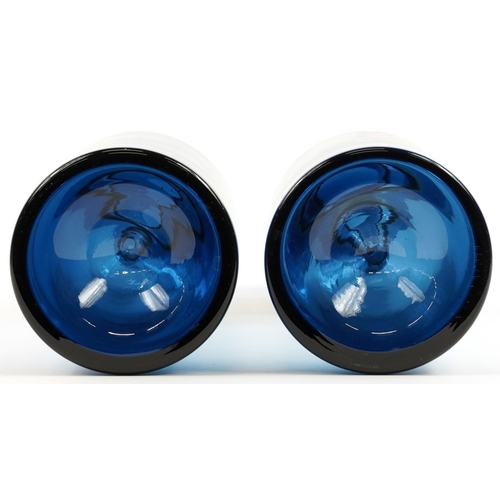 302 - Pair of oversized blue glass display scent bottles with stoppers in the style of Holmegaard, each 53... 