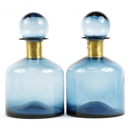 301 - Pair of oversized blue glass display scent bottles with stoppers in the style of Holmegaard, each 37... 