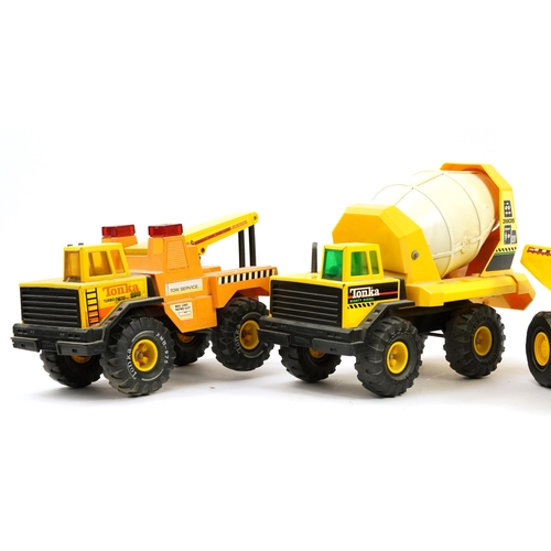 1567 - Four large Tonka construction vehicles including T9 Mighty Tonka Dozer, the largest 54cm in length