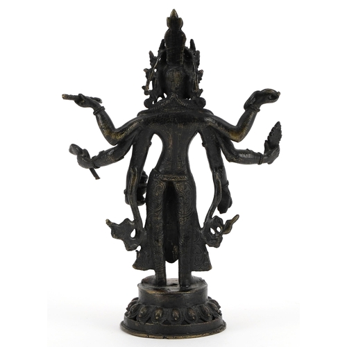 996 - Chino Tibetan patinated bronze figure of standing Buddha, 21cm high