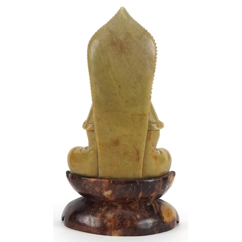 518 - Chinese soapstone carving of seated Buddha on stand, 24cm high