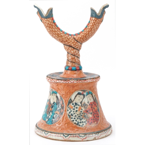 80 - Chinese Islamic pottery candlestick decorated in low relief and hand painted with roundels of figure... 